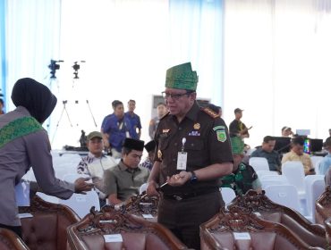 Kajari Kampar, Dwianto Prihartono saat mengikuti peresmian Jembatan merah putih (Foto: Istimewa)